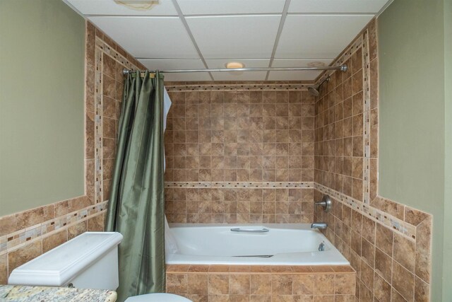 9905 Seapointe Blvd Unit 307, Lower Township, NJ 08260 - full bathroom featuring tile walls, tiled shower / bath, and toilet