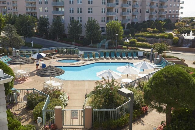 9905 Seapointe Blvd Unit 307, Lower Township, NJ 08260 - community pool featuring a community hot tub and a patio area