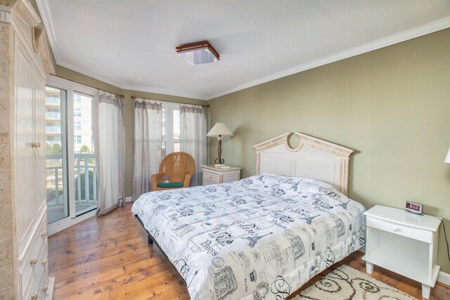 9905 Seapointe Blvd Unit 307, Lower Township, NJ 08260 - bedroom featuring wood finished floors and crown molding