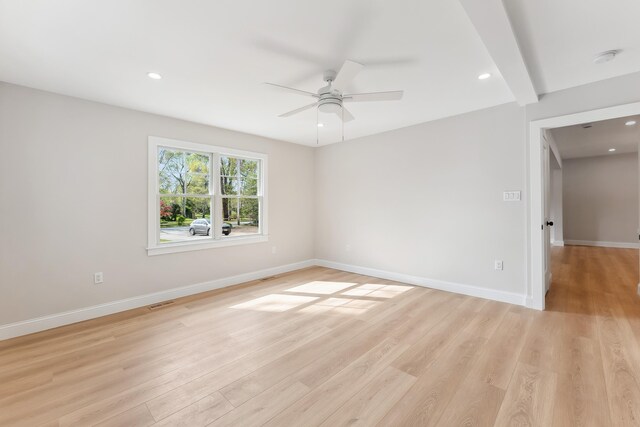 empty room with light wood finished floors, recessed lighting, ceiling fan, and baseboards