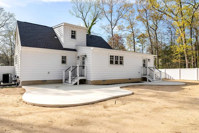 back of house with a patio, crawl space, central AC, roof with shingles, and fence
