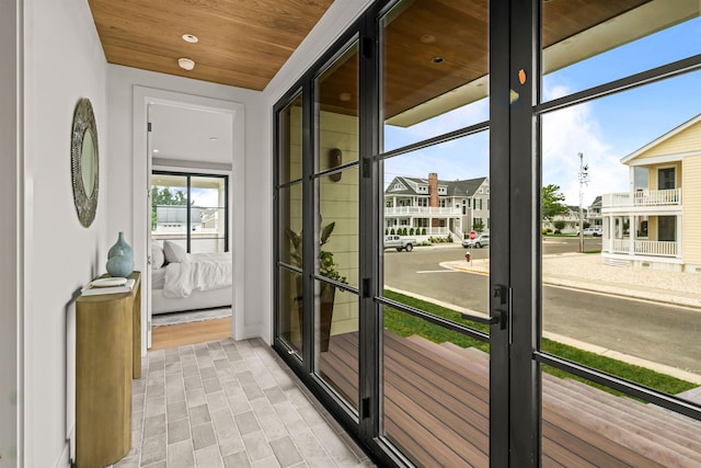 144 89th St, Stone Harbor, NJ 08247 - doorway to outside featuring wood ceiling and french doors