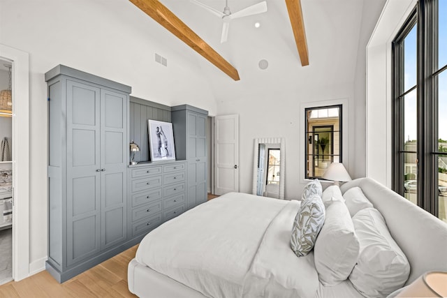 144 89th St, Stone Harbor, NJ 08247 - bedroom featuring beamed ceiling, light wood-style floors, a ceiling fan, and high vaulted ceiling