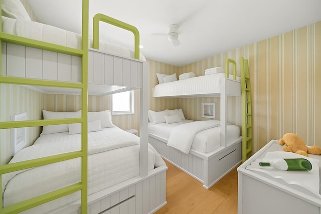 144 89th St, Stone Harbor, NJ 08247 - bedroom with wood finished floors, wallpapered walls, and ceiling fan