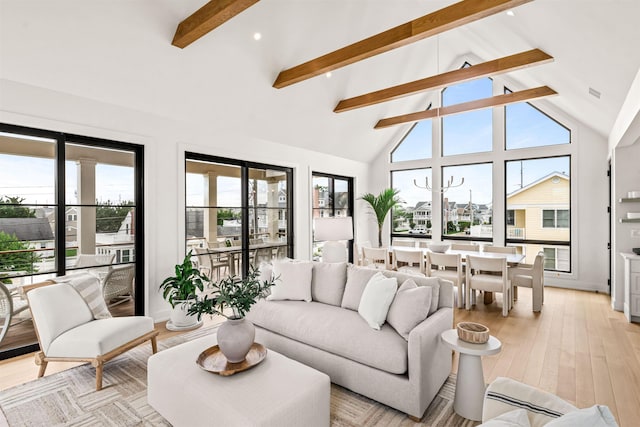 144 89th St, Stone Harbor, NJ 08247 - living area featuring beamed ceiling, light wood-style floors, recessed lighting, and high vaulted ceiling