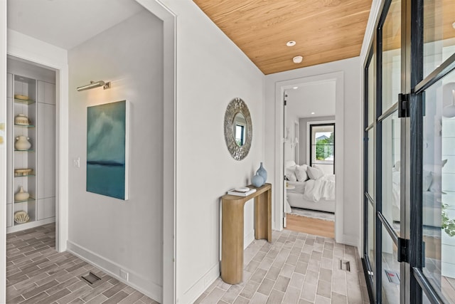 144 89th St, Stone Harbor, NJ 08247 - corridor featuring wooden ceiling, light wood-style floors, and recessed lighting