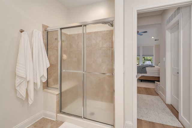 202 Osprey Dr Unit 202, Cape May Court House, NJ 08210 - ensuite bathroom featuring a shower stall, wood finished floors, and a ceiling fan