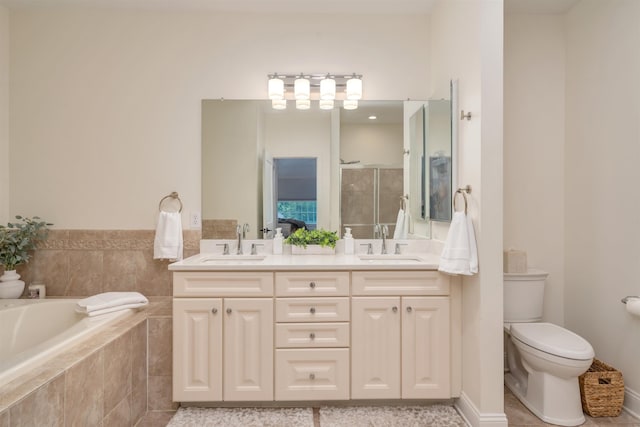 202 Osprey Dr Unit 202, Cape May Court House, NJ 08210 - full bathroom featuring double vanity, a shower stall, a garden tub, and tile patterned flooring