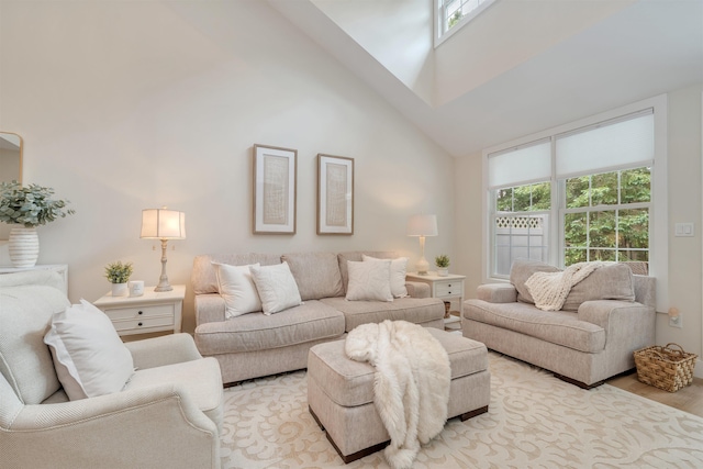 202 Osprey Dr Unit 202, Cape May Court House, NJ 08210 - living area with high vaulted ceiling, healthy amount of natural light, and light wood-style floors