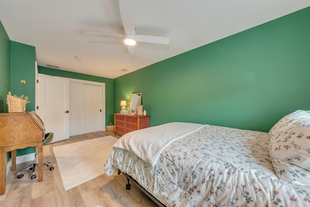 202 Osprey Dr Unit 202, Cape May Court House, NJ 08210 - bedroom with wood finished floors, a closet, and a ceiling fan
