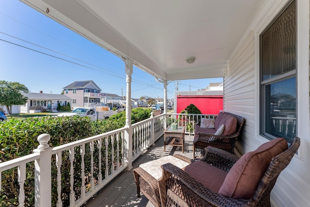 balcony featuring covered porch