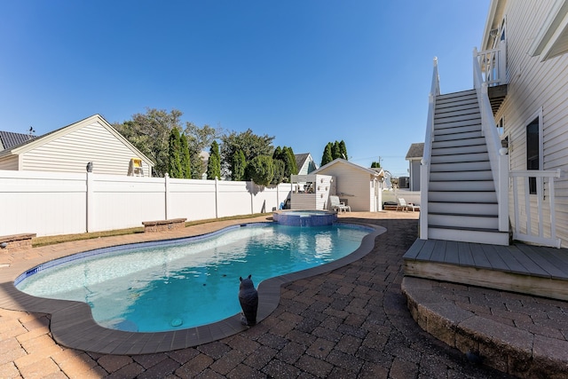 view of swimming pool featuring a patio