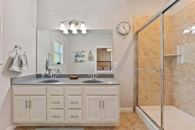 bathroom with vanity, tile patterned floors, and an enclosed shower