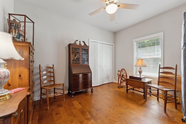 office area with ceiling fan and hardwood / wood-style floors