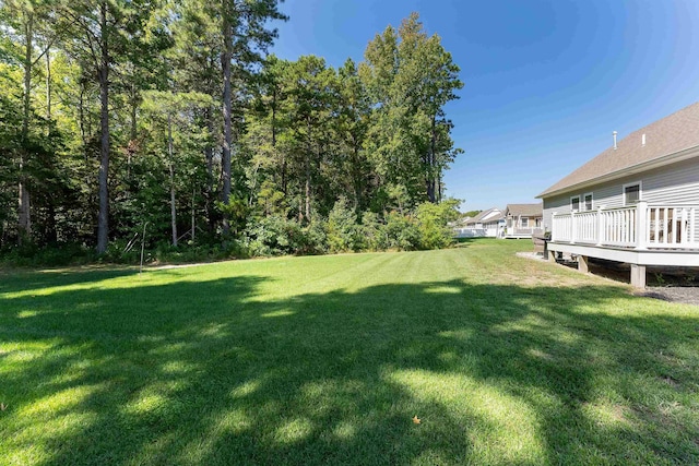 view of yard featuring a deck