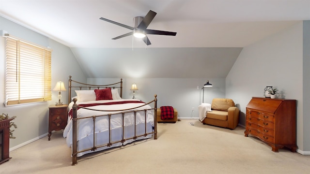 carpeted bedroom featuring ceiling fan and lofted ceiling