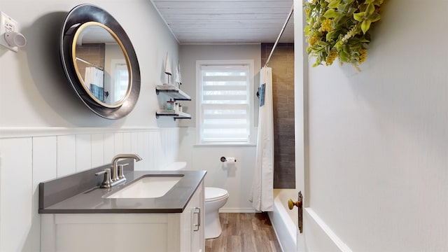 bathroom featuring hardwood / wood-style floors, vanity, wood ceiling, and toilet