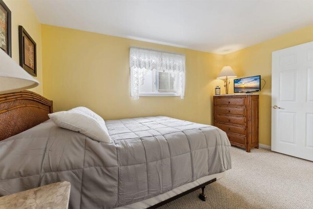 7203 Atlantic Ave Unit 302, Wildwood Crest, NJ 08260 - bedroom featuring light carpet