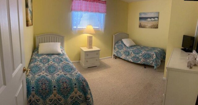 7203 Atlantic Ave Unit 302, Wildwood Crest, NJ 08260 - carpeted bedroom featuring baseboards