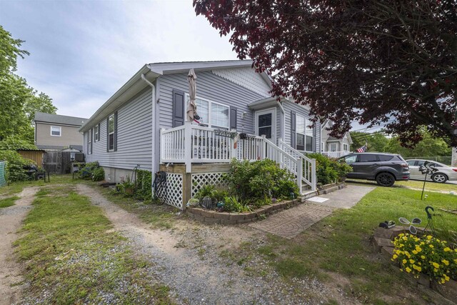 4 Rutledge Ave, Del Haven, NJ 08251 - view of front facade featuring a front lawn