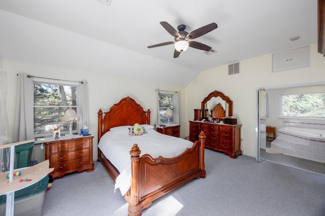 bedroom with ceiling fan, light carpet, and vaulted ceiling