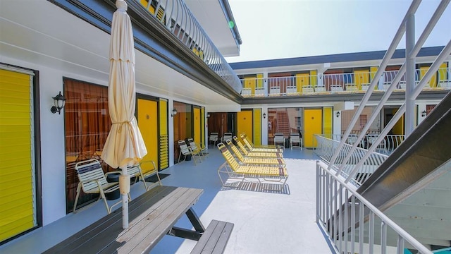 view of patio / terrace with a balcony