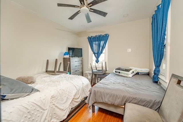 220 E 21st Ave, North Wildwood, NJ 08260 - bedroom featuring wood finished floors, vaulted ceiling, and a ceiling fan