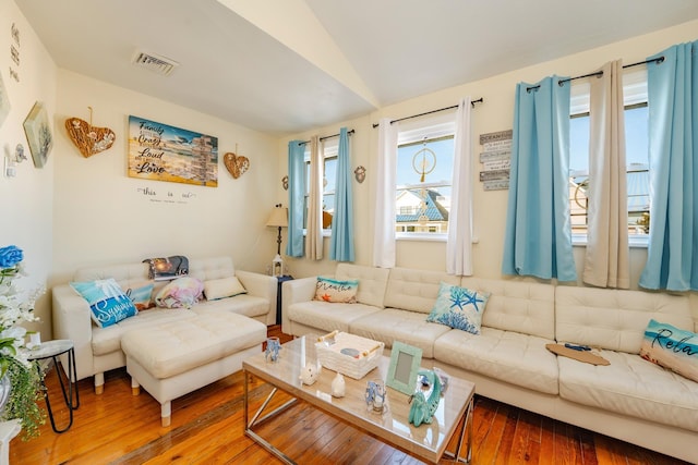 220 E 21st Ave, North Wildwood, NJ 08260 - living room featuring vaulted ceiling, visible vents, and wood-type flooring
