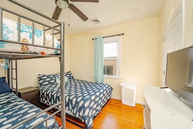 220 E 21st Ave, North Wildwood, NJ 08260 - bedroom with hardwood / wood-style flooring, baseboards, ceiling fan, and visible vents
