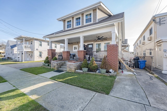 220 E 21st Ave, North Wildwood, NJ 08260 - view of front facade featuring covered porch, a residential view, a shingled roof, and ceiling fan
