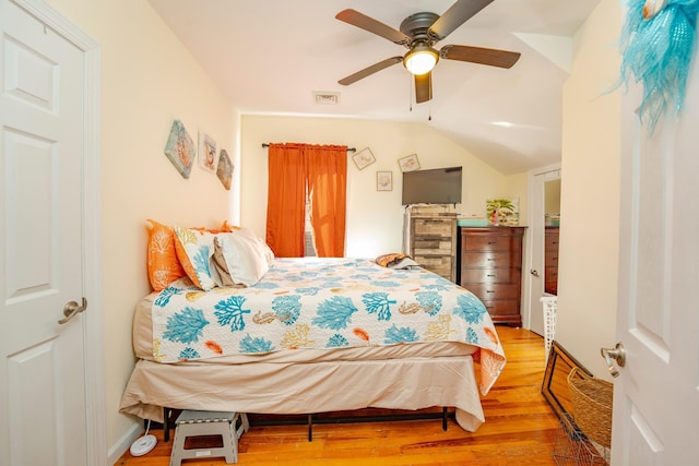 220 E 21st Ave, North Wildwood, NJ 08260 - bedroom with lofted ceiling, visible vents, wood finished floors, and a ceiling fan