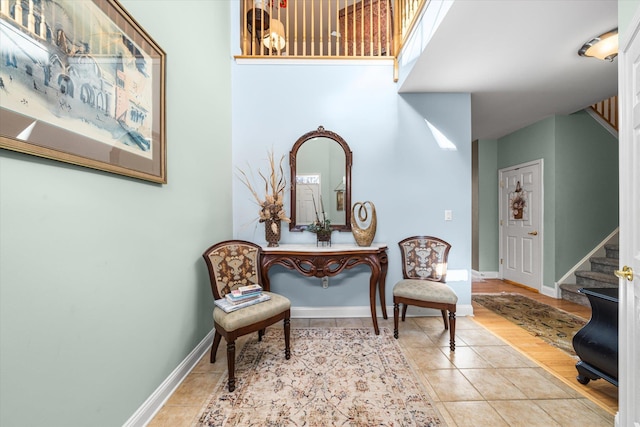 living area with light tile patterned floors