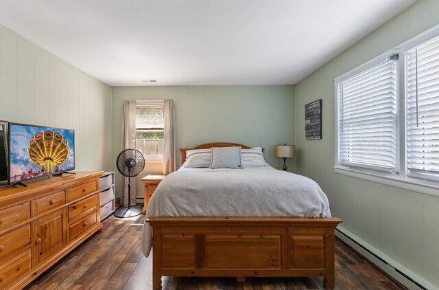 4 Darott Dr, Cape May Court House, NJ 08210 - bedroom featuring baseboard heating, dark wood finished floors, and a baseboard heating unit