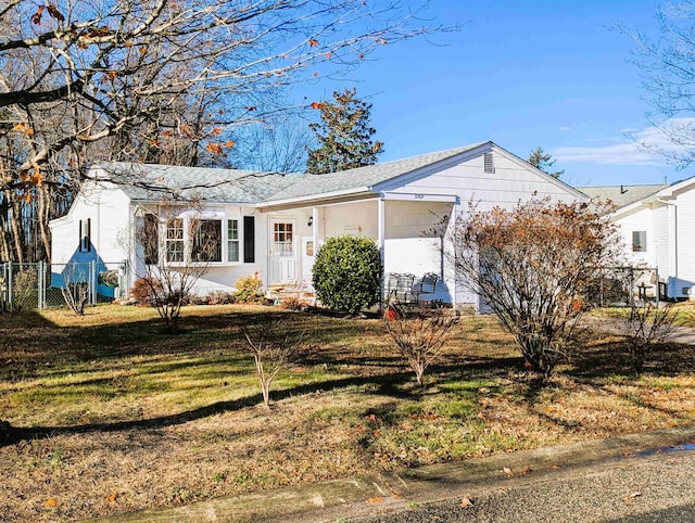 ranch-style house with a front yard