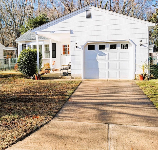 view of front of home with a garage