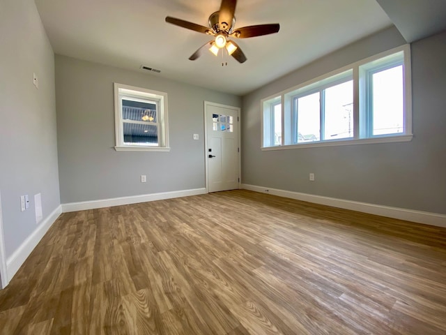 403 E 15th Ave Unit 4Corner, North Wildwood, NJ 08260 - spare room with wood finished floors, baseboards, and a ceiling fan