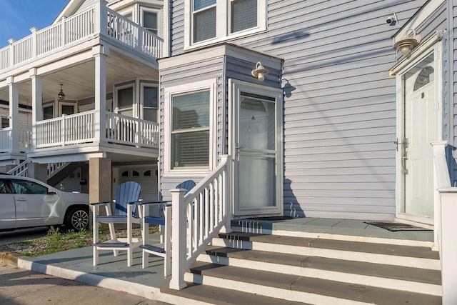 140 E Burk Ave Unit A, Wildwood, NJ 08260 - doorway to property featuring a balcony and a garage
