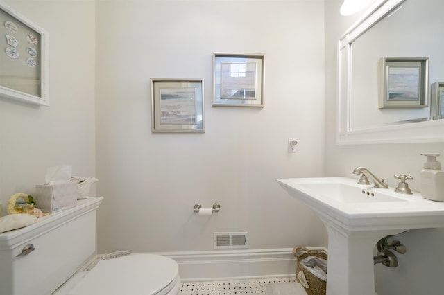 261 45th St, Avalon, NJ 08202 - half bathroom with toilet and baseboards