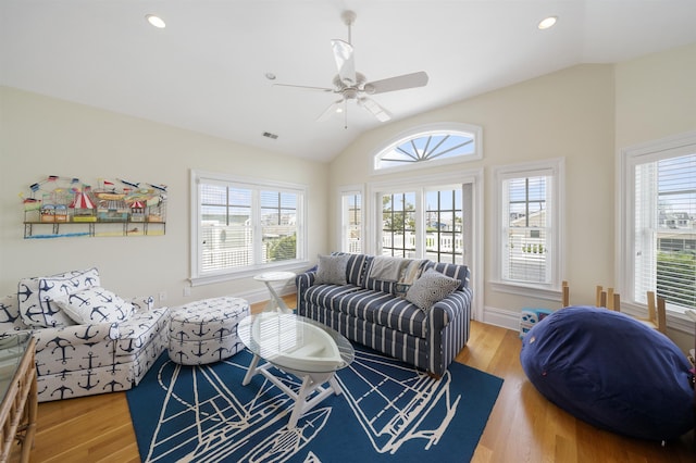 261 45th St, Avalon, NJ 08202 - living area with vaulted ceiling, plenty of natural light, a ceiling fan, wood finished floors, and recessed lighting