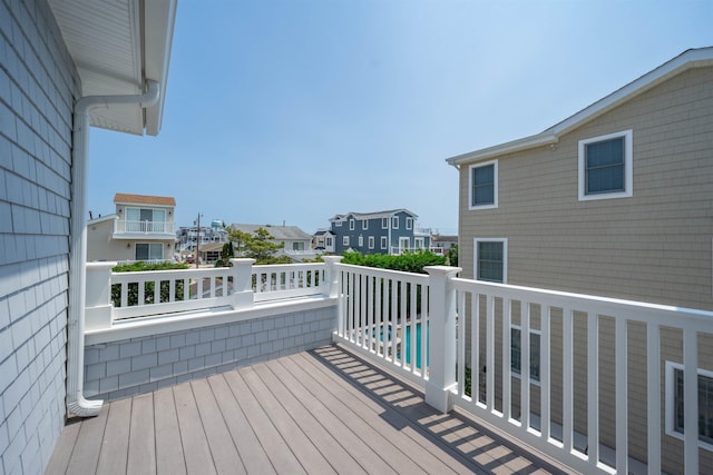 261 45th St, Avalon, NJ 08202 - wooden deck with a residential view