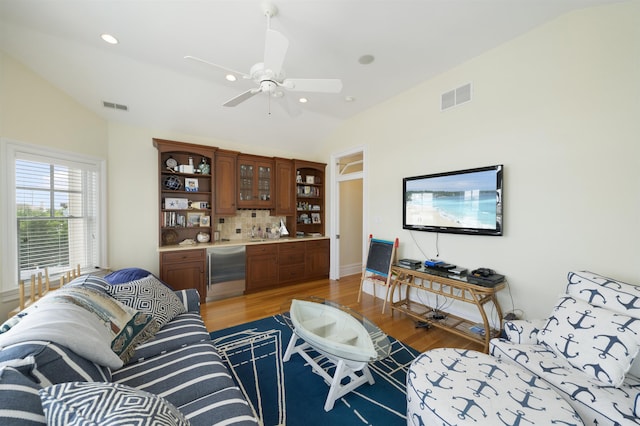 261 45th St, Avalon, NJ 08202 - living area with vaulted ceiling, wine cooler, light wood finished floors, ceiling fan, and recessed lighting