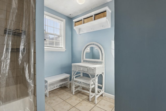 bathroom featuring tile patterned floors and walk in shower