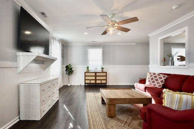 living room featuring crown molding, ceiling fan, and dark hardwood / wood-style floors