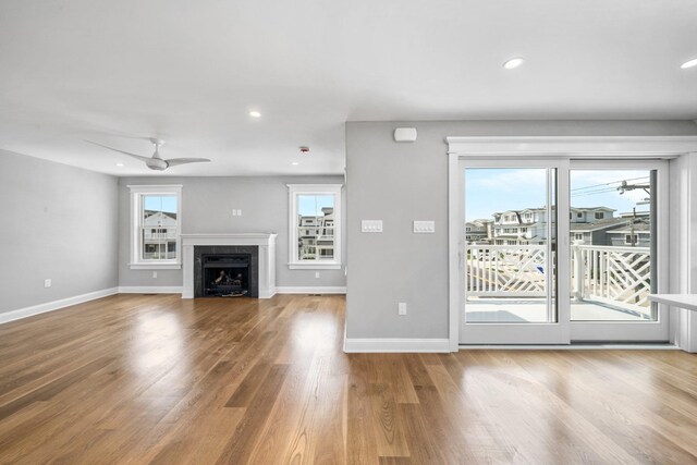 297 24th St Unit 297, Avalon, NJ 08202 - unfurnished living room featuring healthy amount of natural light, baseboards, wood finished floors, and recessed lighting
