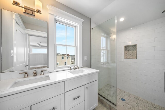 297 24th St Unit 297, Avalon, NJ 08202 - full bath with walk in shower, plenty of natural light, double vanity, and a ceiling fan