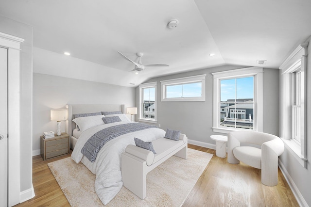 297 24th St Unit 297, Avalon, NJ 08202 - bedroom with lofted ceiling, wood finished floors, baseboards, and a ceiling fan