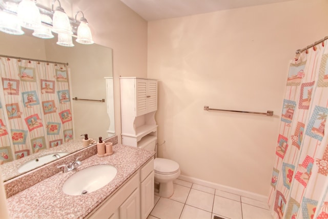 bathroom with toilet, vanity, tile patterned floors, and a shower with shower curtain