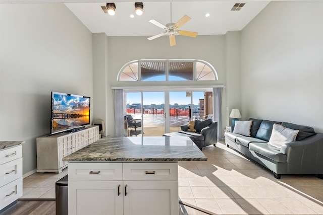 5111 Shawcrest Rd Unit 5111, Lower Township, NJ 08260 - living room with a high ceiling, a ceiling fan, and light tile patterned flooring