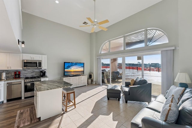 5111 Shawcrest Rd Unit 5111, Lower Township, NJ 08260 - tiled living area with a towering ceiling and ceiling fan