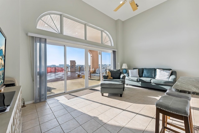 5111 Shawcrest Rd Unit 5111, Lower Township, NJ 08260 - living area featuring a high ceiling, light tile patterned floors, a ceiling fan, and a city view